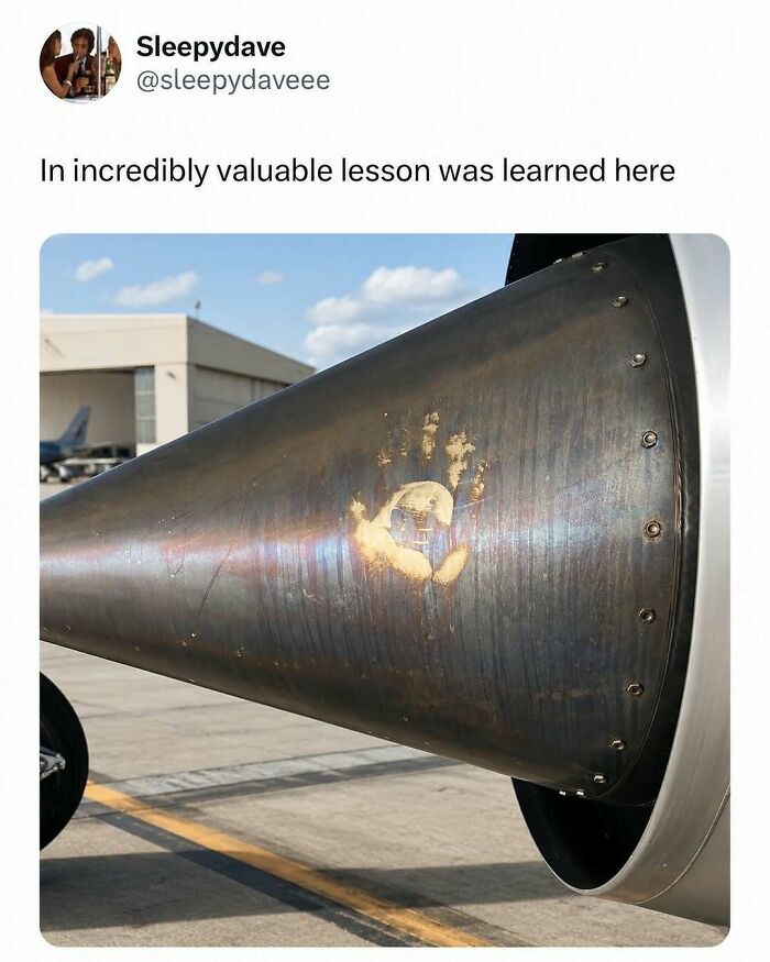 A funny meme showing a handprint burned onto a jet engine, indicating a valuable lesson was learned, offering a quick laugh.