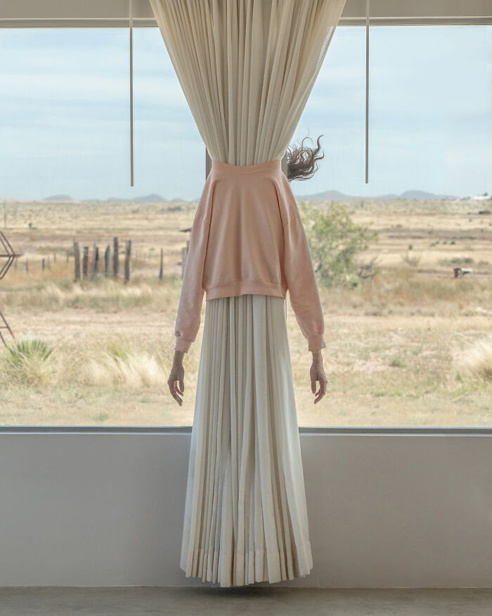 A photographer creates surreal images of a person obscured by a curtain, their arms visible. Everyday places.