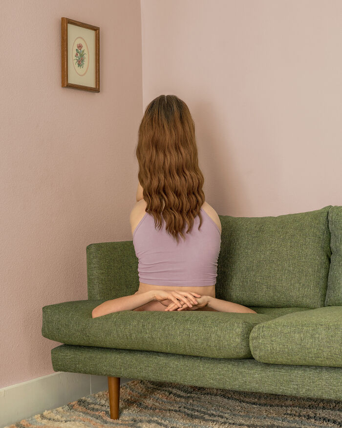 Surreal images: A person sits backward on a green couch, with arms extending from the cushions, creating an uncanny everyday image.