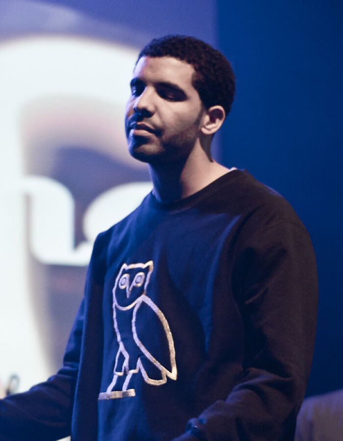 The music artist Drake on stage, illustrating celebrity disillusionment.