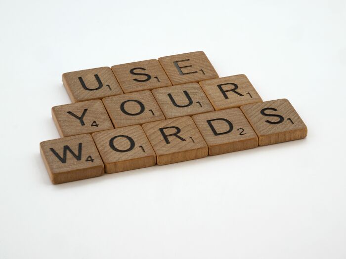 Scrabble tiles spelling USE YOUR WORDS. A visual representation of English sayings and popular idioms. Scrabble tiles spelling USE YOUR WORDS. A visual representation of English sayings and popular idioms.