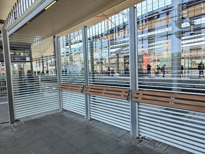 Urban designers failed to consider people's comfort, providing uncomfortable train station benches.