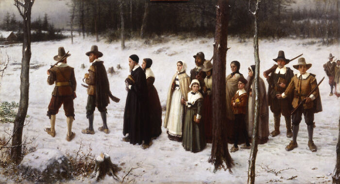 A group of Pilgrims in a snowy landscape, representing a common setting for historical myths.