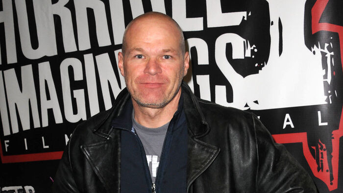 Man with a bald head and leather jacket. The director of the disgraced Hollywood Star's unbanned comeback film. Man with a bald head and leather jacket. The director of the disgraced Hollywood Star's unbanned comeback film.