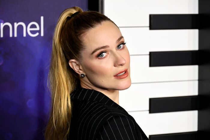 Original actress at a red carpet event, reflecting on the sequel snub. Original actress at a red carpet event, reflecting on the sequel snub.