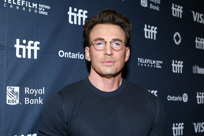 Chris Evans in glasses at an event, a look that has the internet buzzing about his glowdown. Chris Evans in glasses at an event, a look that has the internet buzzing about his glowdown.