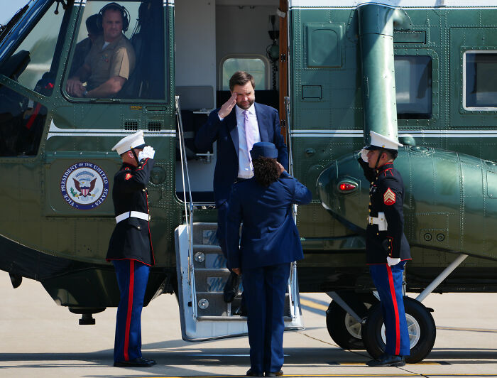 JD Vance exits a helicopter, illustrating his lifestyle and the context of his family life. JD Vance exits a helicopter, illustrating his lifestyle and the context of his family life.