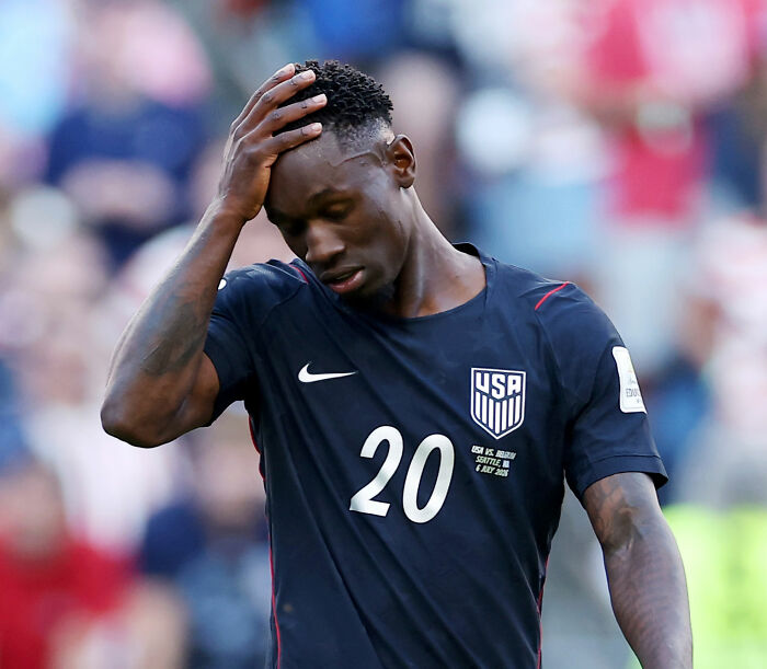 USA soccer player looking dejected after World Cup elimination, as Ryanair mocks the USA with a savage post. USA soccer player looking dejected after World Cup elimination, as Ryanair mocks the USA with a savage post.