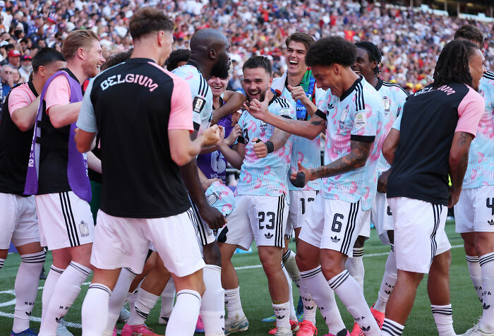 Belgian soccer players celebrating, after the USA World Cup elimination, as Ryanair mocks the USA. Belgian soccer players celebrating, after the USA World Cup elimination, as Ryanair mocks the USA.