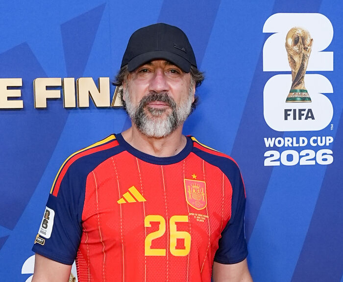 Javier Bardem in a Spanish National Team jersey, praising their World Cup celebration response. Javier Bardem in a Spanish National Team jersey, praising their World Cup celebration response.