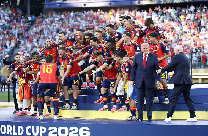 Donald Trump on stage with FIFA World Cup Final players in New York, possibly getting booed. Donald Trump on stage with FIFA World Cup Final players in New York, possibly getting booed.