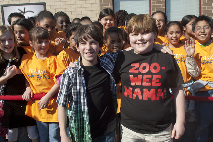 Diary Of A Wimpy Kid stars unrecognizable at 28, posing with kids from the film. Diary Of A Wimpy Kid stars unrecognizable at 28, posing with kids from the film.
