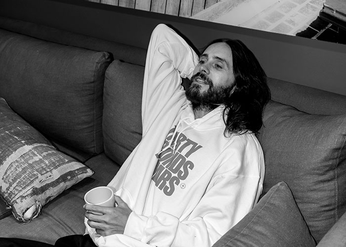 Jared Leto, the Hollywood predator, relaxes on a couch, facing new allegations from four women. Jared Leto, the Hollywood predator, relaxes on a couch, facing new allegations from four women.