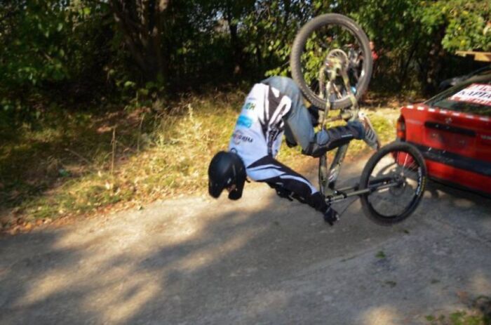 A hilarious photo taken moments before disaster struck: a cyclist mid-fall with his bike.