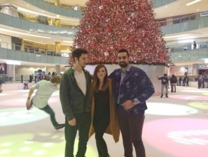 A hilarious photo taken moments before disaster struck: a man falling on an ice rink.