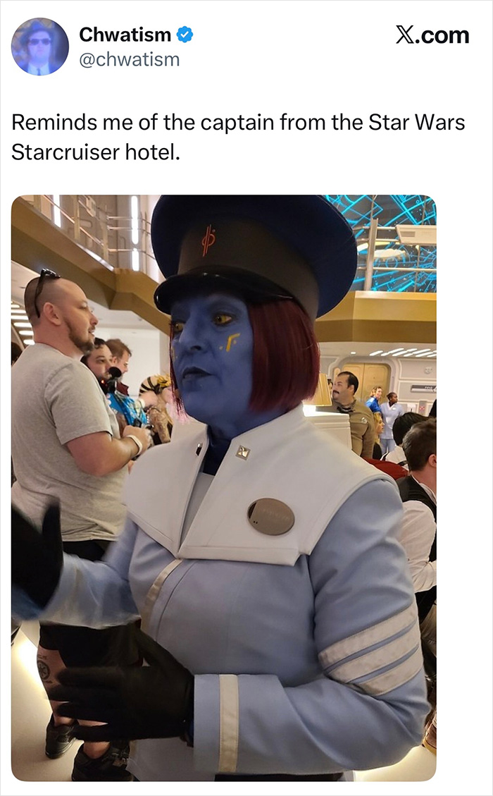 A person in blue makeup and a Star Wars uniform, a disastrous mistake in a Hollywood blockbuster, with others in the background.