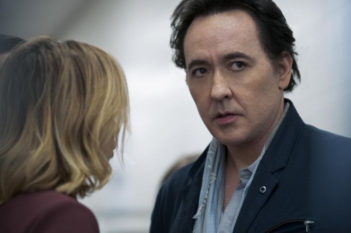 John Cusack in a serious moment, addressing his vanishing from Hollywood and sister Joan's return after 11 years.