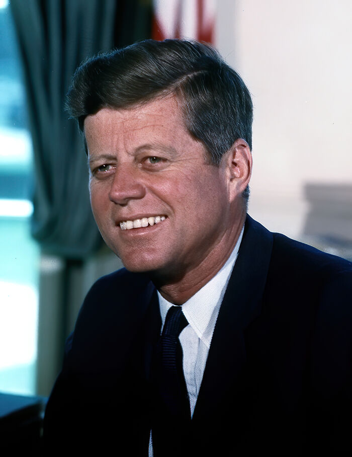 A color portrait of John F. Kennedy, whose assassination is one of the unsolved mysteries.
