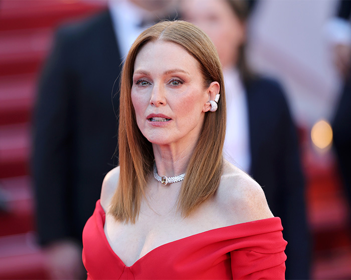 Julianne Moore in red dress, red carpet. One of the celebrity mysteries that are still unsolved.