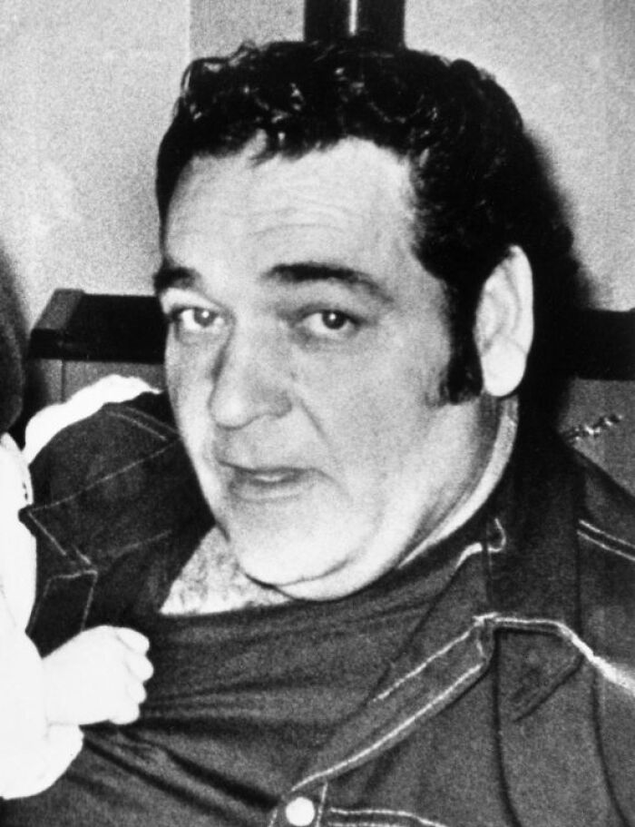 A black and white photo of a man with dark hair, a notable figure in famous mysteries.