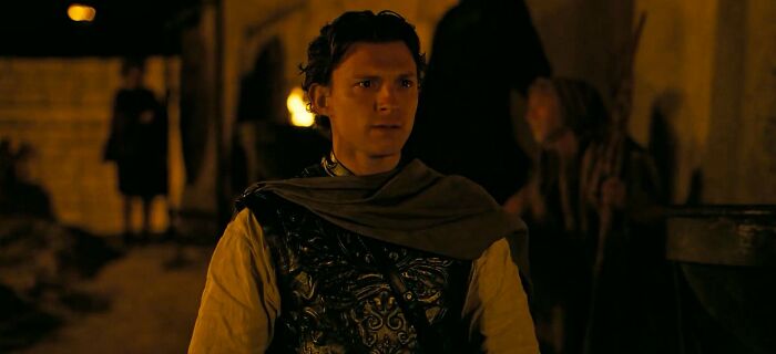 A young man in period costume looks off to the side, highlighting the Age Gap in The Odyssey and Hollywood practice. A young man in period costume looks off to the side, highlighting the Age Gap in The Odyssey and Hollywood practice.