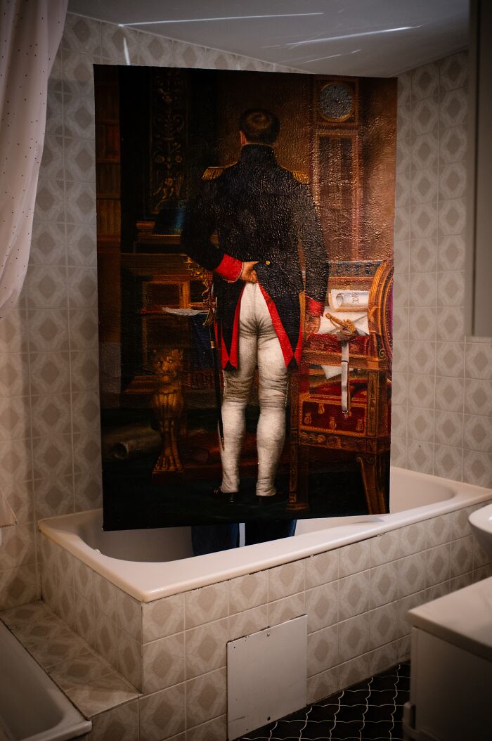 A fascinating artwork by an artist reimagining a famous masterpiece from behind, depicting Napoleon in his study.