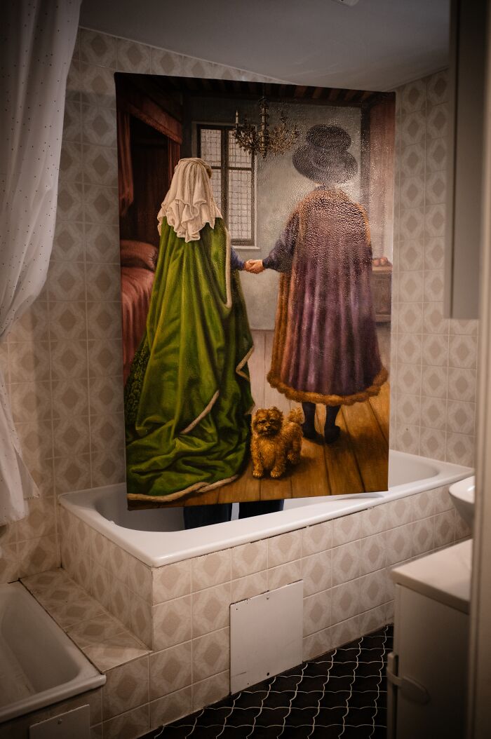 Artist reimagined a famous masterpiece from behind, depicting two figures and a small dog in an interior.