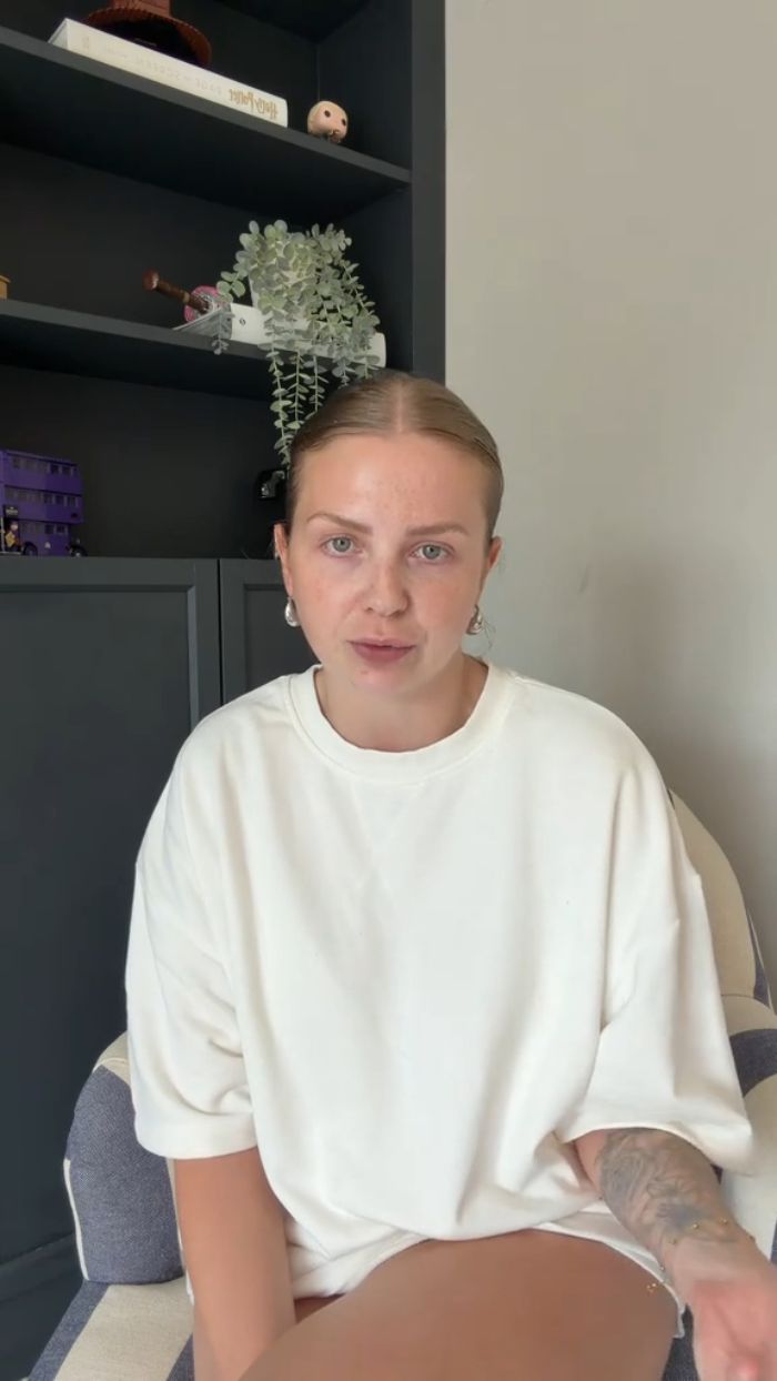A woman discussing her controversial choice of cosmetic surgery for her child, raising eyebrows with her decision. A woman discussing her controversial choice of cosmetic surgery for her child, raising eyebrows with her decision.