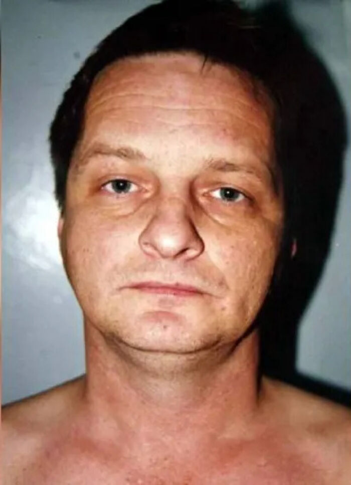 Mugshot of a man, potentially a suspect in one of the mystery cases, where people know who is to blame.