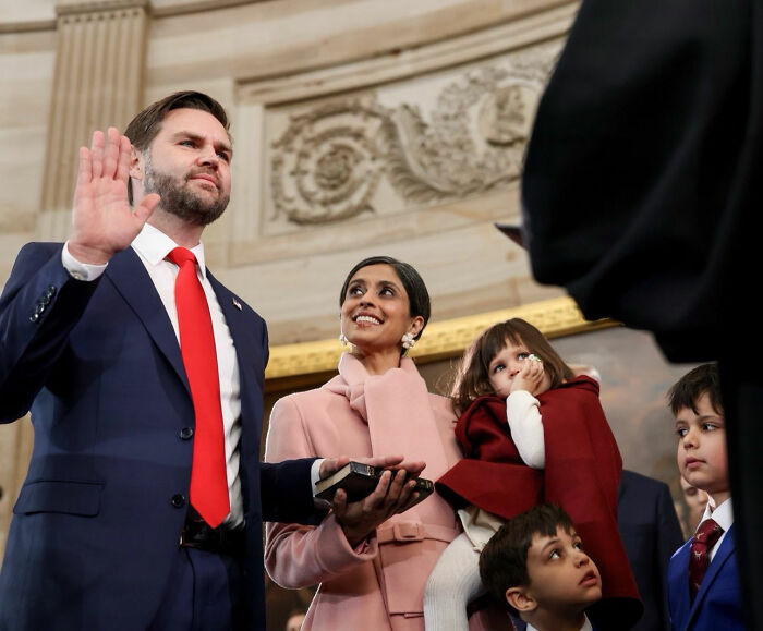 JD Vance and wife Usha with their children during an oath ceremony for the birth of their fourth child. JD Vance and wife Usha with their children during an oath ceremony for the birth of their fourth child.