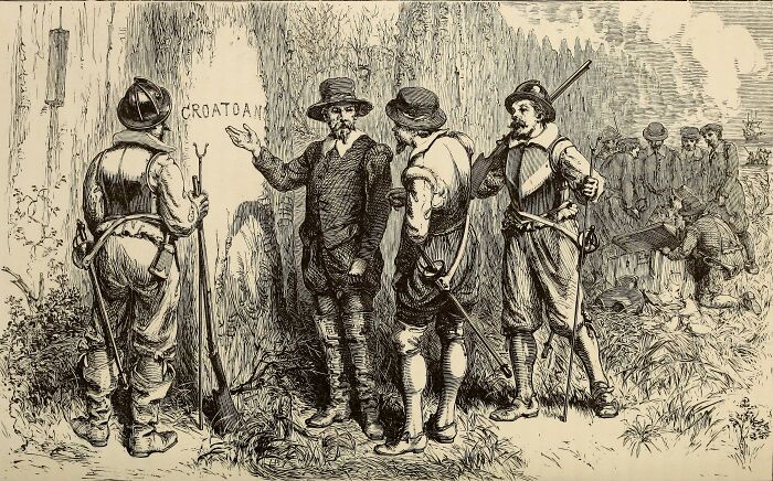 An illustration of colonists discovering the word CROATOAN carved into a tree, a famous historical mystery.