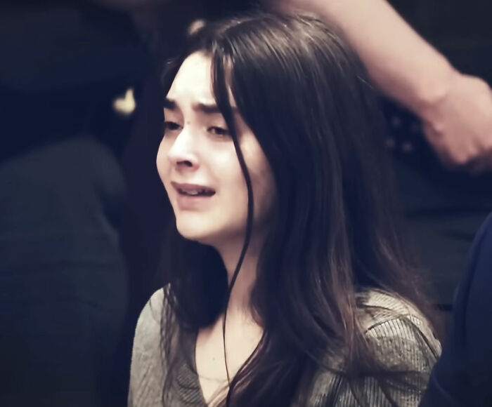 Mackenzie Shirilla prison photo, showing her crying with long dark hair, a poignant moment after a legal setback. Mackenzie Shirilla prison photo, showing her crying with long dark hair, a poignant moment after a legal setback.