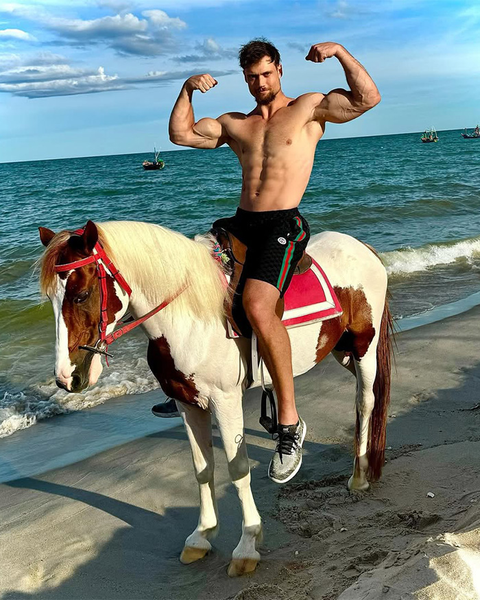 A lookmaxxer shows his extreme transformation, flexing muscles on a horse by the beach. A lookmaxxer shows his extreme transformation, flexing muscles on a horse by the beach.