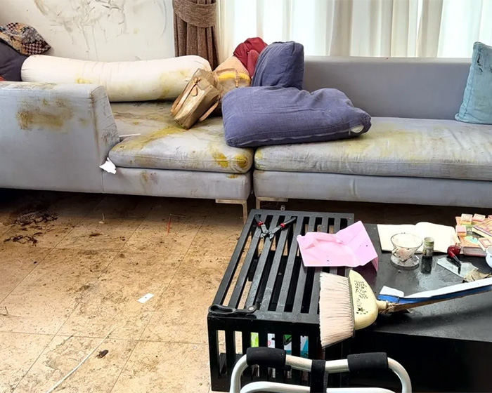 Messy living room with overturned furniture and debris, hinting at the lookmaxxer's bizarre passing. Messy living room with overturned furniture and debris, hinting at the lookmaxxer's bizarre passing.