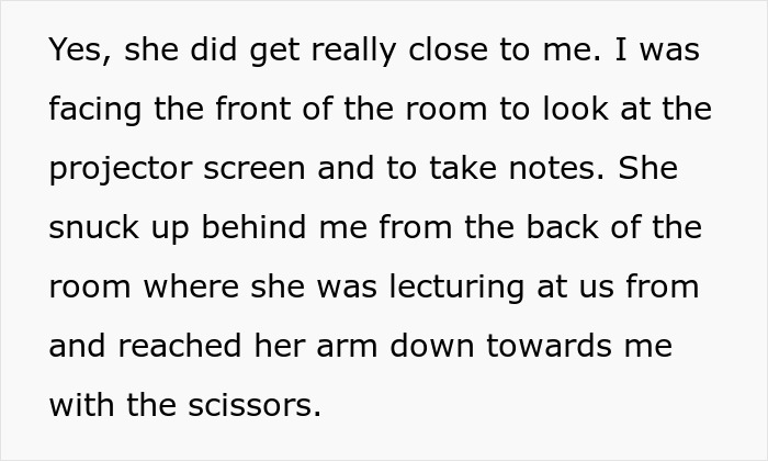 A teacher gets too close to a student, reaching for them with scissors, learning a lesson instead. A teacher gets too close to a student, reaching for them with scissors, learning a lesson instead.