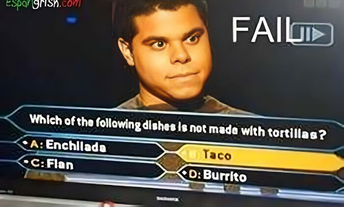 A contestant displays a surprised face after giving a dumb Who Wants To Be A Millionaire answer, incorrectly identifying a dish.