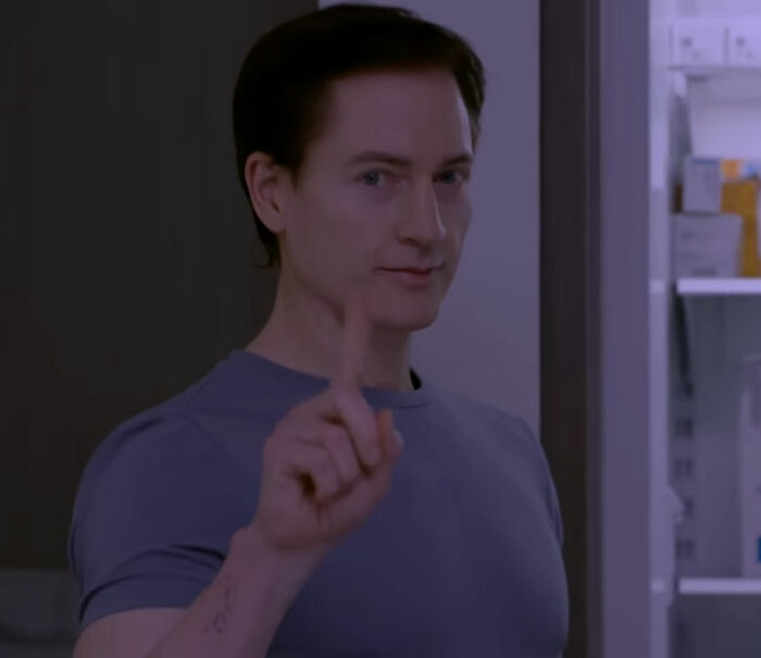 Biohacker Bryan Johnson, in a purple shirt, pointing a finger, revealing a dreadful diagnosis despite his health regimen. Biohacker Bryan Johnson, in a purple shirt, pointing a finger, revealing a dreadful diagnosis despite his health regimen.