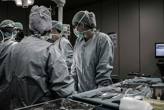 Surgeons in an operating room, highlighting beautiful facts in medicine and healthcare.
