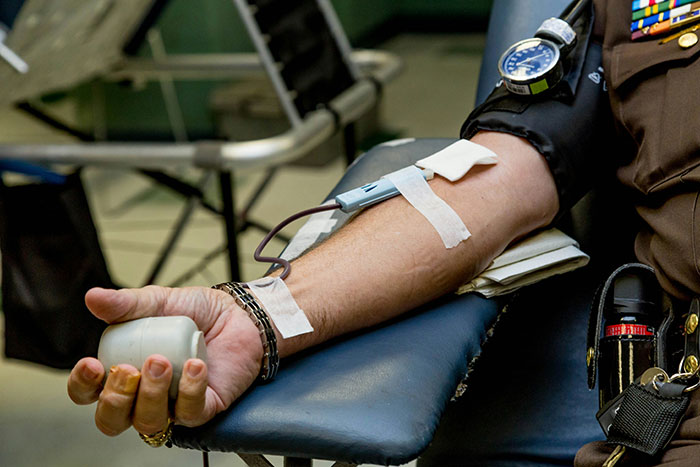 A person donating blood, highlighting beautiful facts about human generosity and medical science.