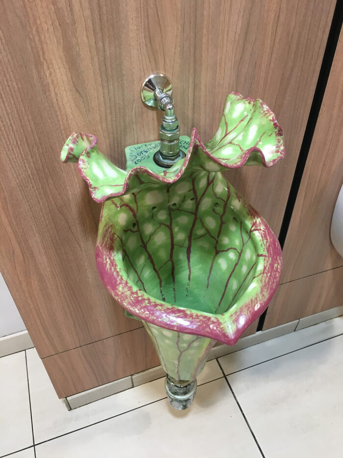 A pitcher plant-shaped urinal, an example of designers transforming ordinary things brilliantly.