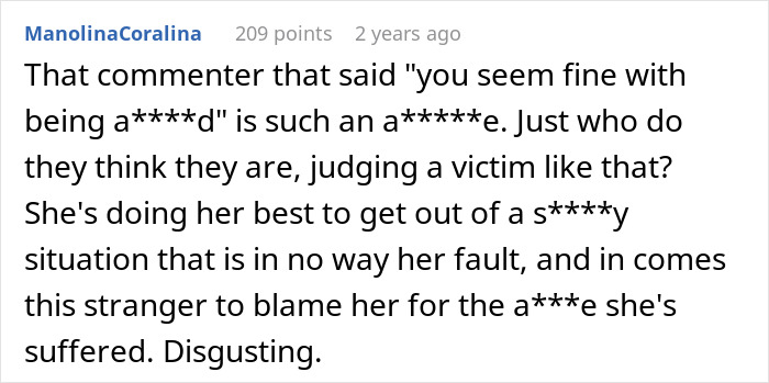 A screenshot of a Reddit comment criticizing someone for blaming a victim of a husband's violent reaction, calling the commenter a*****e. A screenshot of a Reddit comment criticizing someone for blaming a victim of a husband's violent reaction, calling the commenter a*****e.