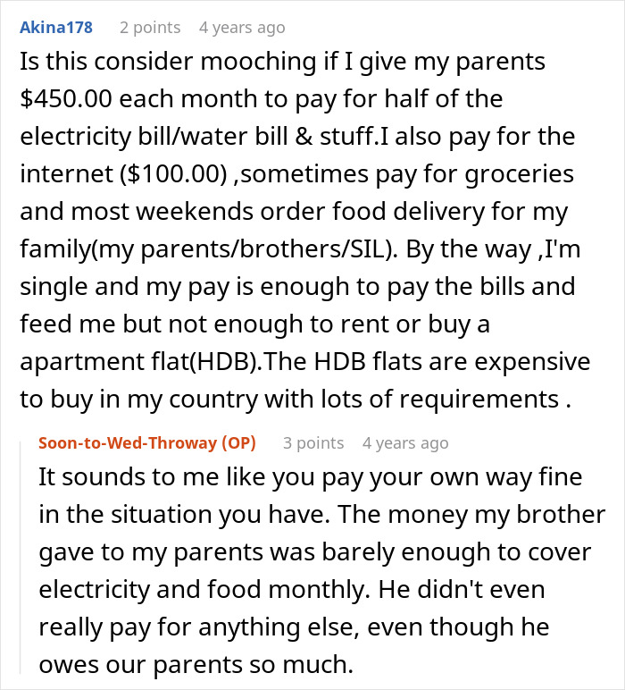 A Reddit comment asking if paying rent is mooching, with a reply about the entitled man's brother not paying his way.