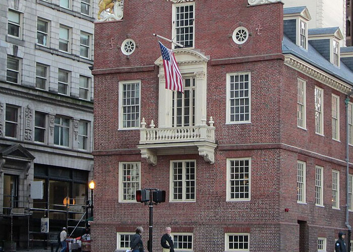 America: Old State House in Boston with American flag, a historic building.