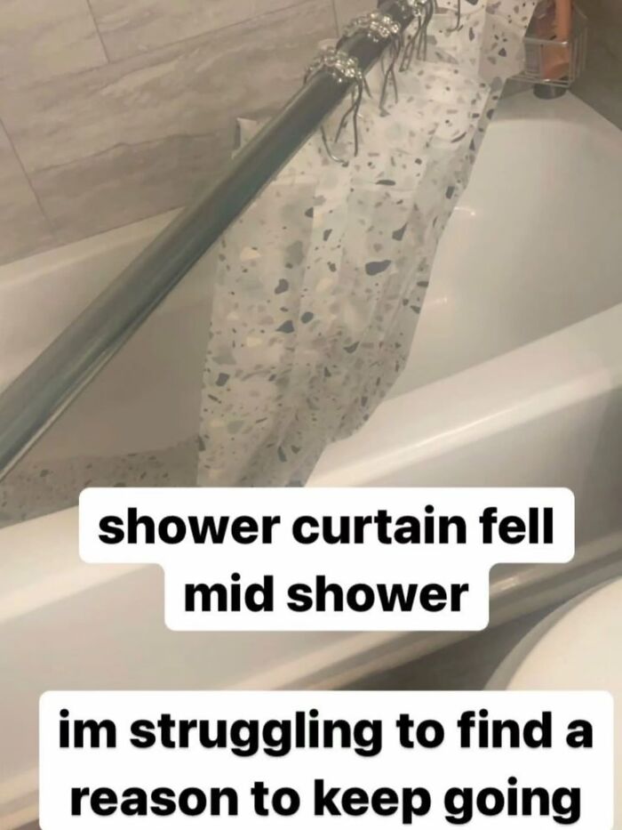 A shower curtain fallen into a bathtub, with overlay text describing a painfully cringe moment.