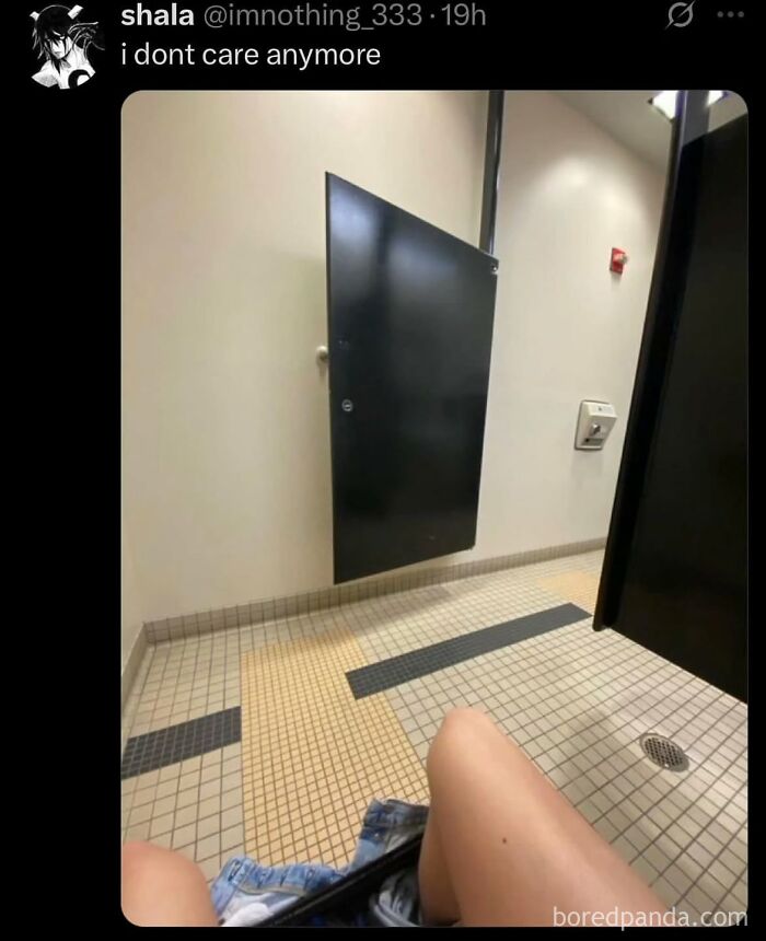 A view from inside a toilet stall with a broken door that is floating mid-air, a cringe post about public restrooms.