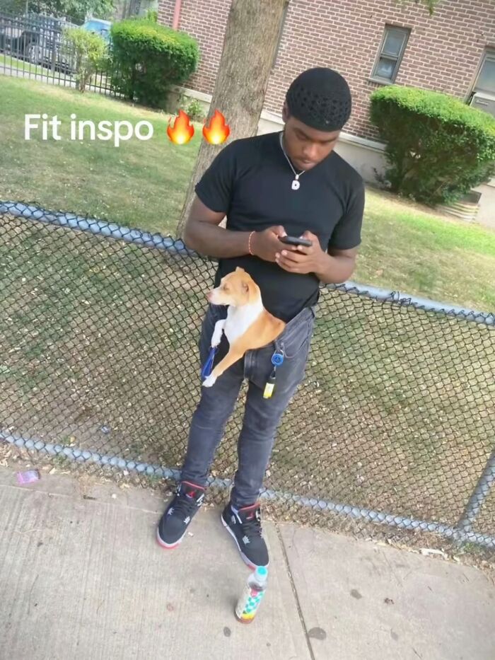 A man with a small dog in his pants, showcasing one of the cringe posts that get funnier the longer you look.