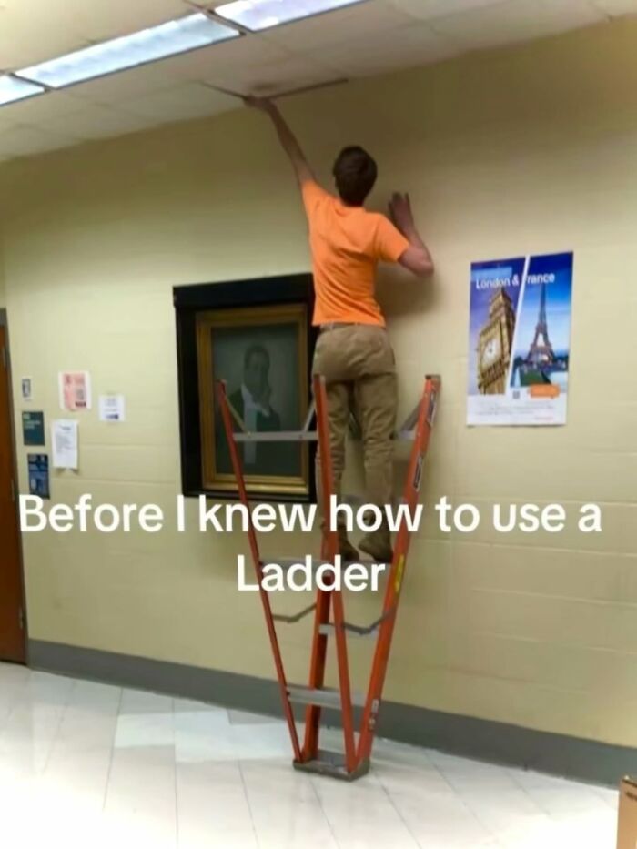 A person standing unsafely on a ladder reaching for the ceiling, a painfully cringe post about ladder use.