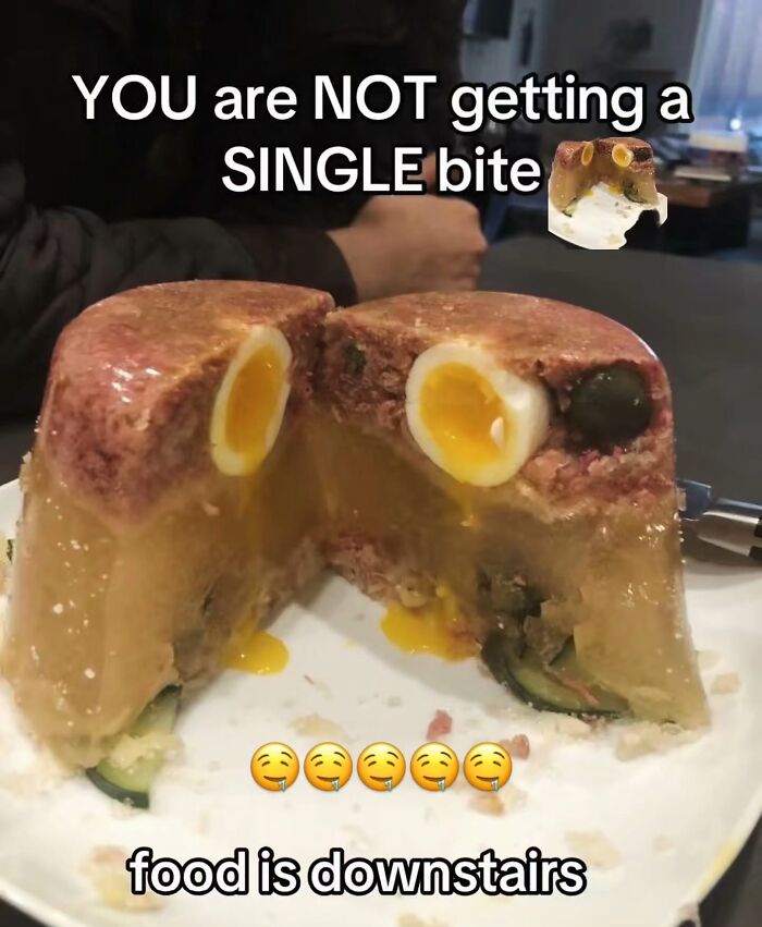 A bizarre gelatin mold with eggs and meat, meant to be a cringe post about funny food.