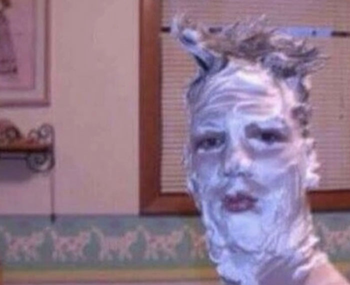 A person covered in shaving cream, making a funny face, one of the camera roll photos that need no explanation.