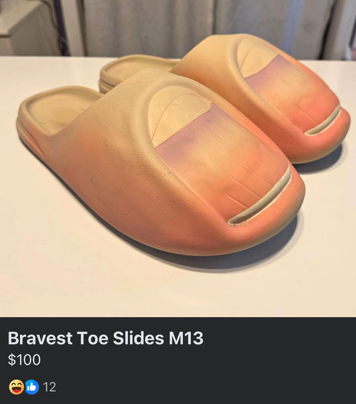 A camera roll photo of unusual toe-shaped slides, beige and peach, on a white surface with a price tag.